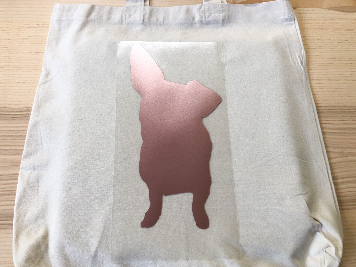 Laying bottom layer on tote bag